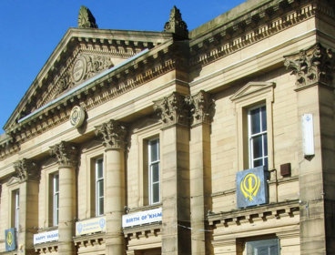 The facade of the former Sion Baptist Chapel on Peckover Street, now a Sikh Gurdwara.